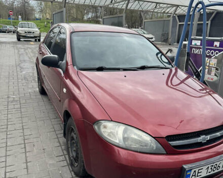 Красный Шевроле Лачетти, объемом двигателя 1.6 л и пробегом 251 тыс. км за 4000 $, фото 1 на Automoto.ua