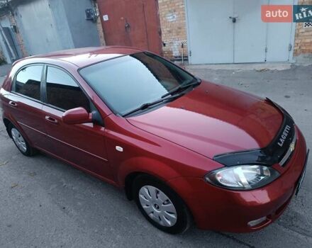 Красный Шевроле Лачетти, объемом двигателя 1.6 л и пробегом 261 тыс. км за 3650 $, фото 4 на Automoto.ua