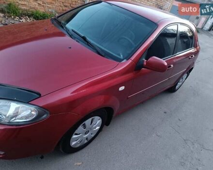 Красный Шевроле Лачетти, объемом двигателя 1.6 л и пробегом 261 тыс. км за 3650 $, фото 3 на Automoto.ua