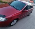 Красный Шевроле Лачетти, объемом двигателя 1.6 л и пробегом 261 тыс. км за 3650 $, фото 3 на Automoto.ua