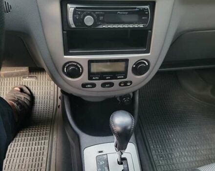 Красный Шевроле Лачетти, объемом двигателя 1.8 л и пробегом 110 тыс. км за 4600 $, фото 11 на Automoto.ua