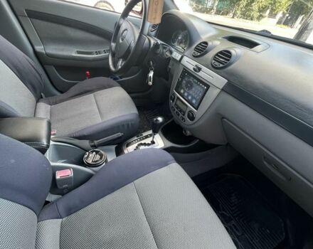 Красный Шевроле Лачетти, объемом двигателя 1.8 л и пробегом 250 тыс. км за 4000 $, фото 8 на Automoto.ua