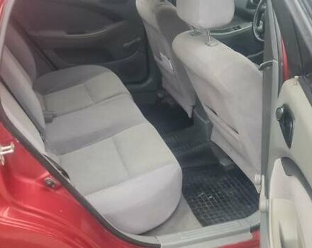 Красный Шевроле Лачетти, объемом двигателя 1.4 л и пробегом 259 тыс. км за 3500 $, фото 4 на Automoto.ua