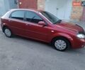 Красный Шевроле Лачетти, объемом двигателя 1.6 л и пробегом 261 тыс. км за 3650 $, фото 8 на Automoto.ua