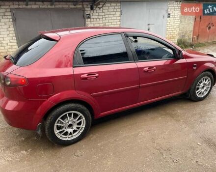 Красный Шевроле Лачетти, объемом двигателя 1.8 л и пробегом 121 тыс. км за 3750 $, фото 27 на Automoto.ua