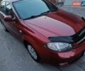 Красный Шевроле Лачетти, объемом двигателя 1.6 л и пробегом 261 тыс. км за 3650 $, фото 13 на Automoto.ua