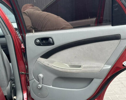 Красный Шевроле Лачетти, объемом двигателя 1.6 л и пробегом 251 тыс. км за 4000 $, фото 26 на Automoto.ua