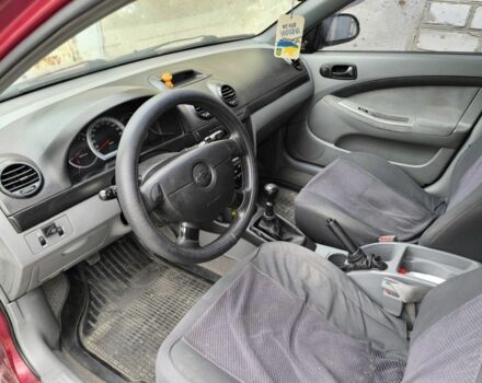 Красный Шевроле Лачетти, объемом двигателя 1.6 л и пробегом 300 тыс. км за 4200 $, фото 8 на Automoto.ua