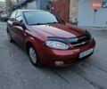 Красный Шевроле Лачетти, объемом двигателя 1.6 л и пробегом 261 тыс. км за 3650 $, фото 6 на Automoto.ua