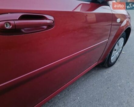 Красный Шевроле Лачетти, объемом двигателя 1.6 л и пробегом 261 тыс. км за 3650 $, фото 19 на Automoto.ua