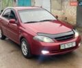 Красный Шевроле Лачетти, объемом двигателя 1.8 л и пробегом 121 тыс. км за 3750 $, фото 13 на Automoto.ua