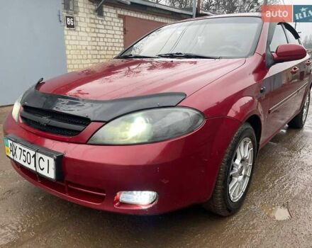 Красный Шевроле Лачетти, объемом двигателя 1.8 л и пробегом 121 тыс. км за 3750 $, фото 20 на Automoto.ua