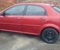 Красный Шевроле Лачетти, объемом двигателя 1.4 л и пробегом 259 тыс. км за 3500 $, фото 11 на Automoto.ua
