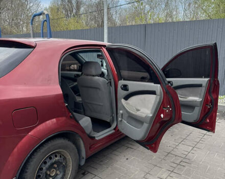 Красный Шевроле Лачетти, объемом двигателя 1.6 л и пробегом 251 тыс. км за 4000 $, фото 38 на Automoto.ua