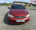 Красный Шевроле Лачетти, объемом двигателя 1.4 л и пробегом 258 тыс. км за 3300 $, фото 2 на Automoto.ua