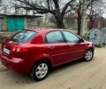 Красный Шевроле Лачетти, объемом двигателя 1.4 л и пробегом 200 тыс. км за 4000 $, фото 6 на Automoto.ua