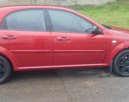 Красный Шевроле Лачетти, объемом двигателя 1.4 л и пробегом 259 тыс. км за 3500 $, фото 12 на Automoto.ua