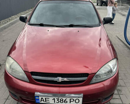 Красный Шевроле Лачетти, объемом двигателя 1.6 л и пробегом 251 тыс. км за 4000 $, фото 4 на Automoto.ua