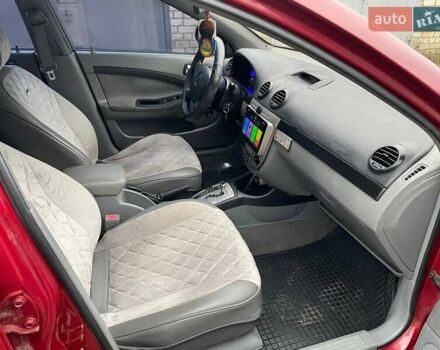 Красный Шевроле Лачетти, объемом двигателя 1.8 л и пробегом 121 тыс. км за 3750 $, фото 33 на Automoto.ua