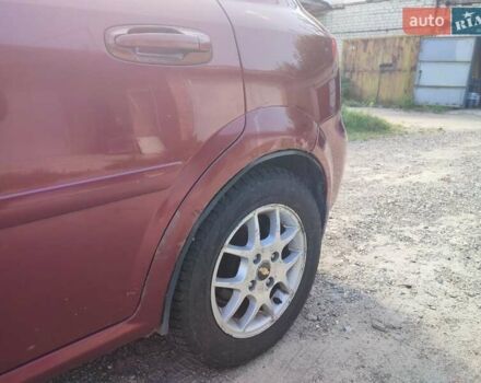 Красный Шевроле Лачетти, объемом двигателя 1.8 л и пробегом 202 тыс. км за 4400 $, фото 3 на Automoto.ua