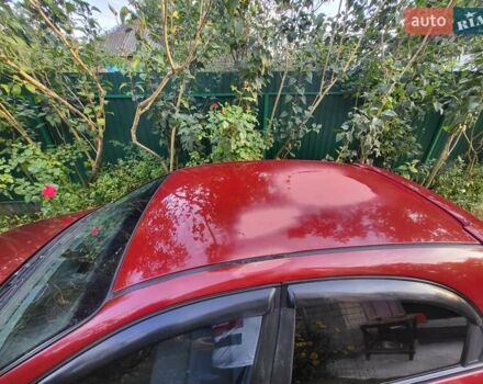 Красный Шевроле Лачетти, объемом двигателя 1.8 л и пробегом 110 тыс. км за 4600 $, фото 22 на Automoto.ua