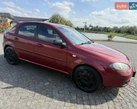 Красный Шевроле Лачетти, объемом двигателя 1.4 л и пробегом 258 тыс. км за 3300 $, фото 8 на Automoto.ua