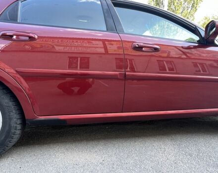 Красный Шевроле Лачетти, объемом двигателя 1.8 л и пробегом 250 тыс. км за 4000 $, фото 3 на Automoto.ua