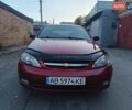Красный Шевроле Лачетти, объемом двигателя 1.6 л и пробегом 261 тыс. км за 3650 $, фото 1 на Automoto.ua