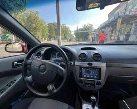 Красный Шевроле Лачетти, объемом двигателя 1.8 л и пробегом 250 тыс. км за 4000 $, фото 6 на Automoto.ua