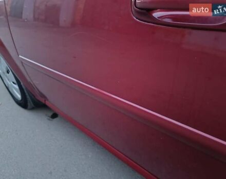 Красный Шевроле Лачетти, объемом двигателя 1.6 л и пробегом 261 тыс. км за 3650 $, фото 16 на Automoto.ua