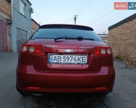 Красный Шевроле Лачетти, объемом двигателя 1.6 л и пробегом 261 тыс. км за 3650 $, фото 2 на Automoto.ua