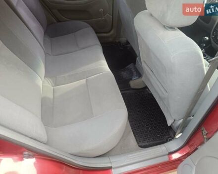 Красный Шевроле Лачетти, объемом двигателя 1.6 л и пробегом 261 тыс. км за 3650 $, фото 22 на Automoto.ua