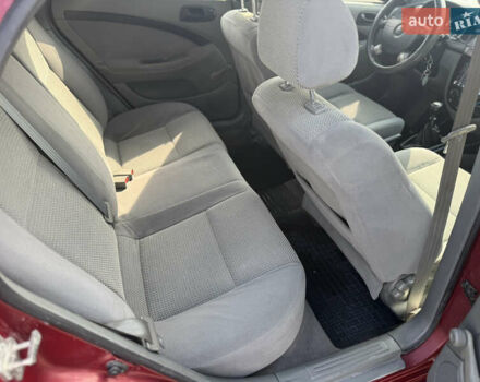 Красный Шевроле Лачетти, объемом двигателя 1.4 л и пробегом 258 тыс. км за 3300 $, фото 18 на Automoto.ua