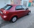 Красный Шевроле Лачетти, объемом двигателя 1.6 л и пробегом 261 тыс. км за 3650 $, фото 9 на Automoto.ua