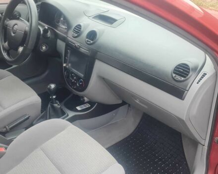 Красный Шевроле Лачетти, объемом двигателя 1.4 л и пробегом 259 тыс. км за 3500 $, фото 10 на Automoto.ua