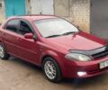 Червоний Шевроле Лачетті, об'ємом двигуна 1.8 л та пробігом 121 тис. км за 3750 $, фото 1 на Automoto.ua