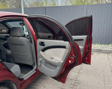 Красный Шевроле Лачетти, объемом двигателя 1.6 л и пробегом 251 тыс. км за 4000 $, фото 39 на Automoto.ua