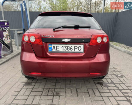 Красный Шевроле Лачетти, объемом двигателя 1.6 л и пробегом 251 тыс. км за 4000 $, фото 9 на Automoto.ua