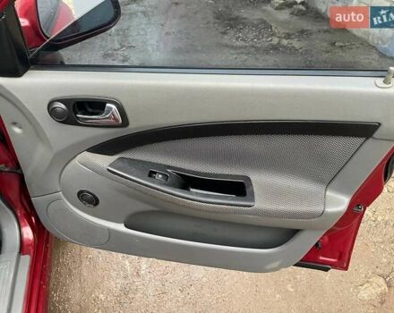 Красный Шевроле Лачетти, объемом двигателя 1.8 л и пробегом 121 тыс. км за 3750 $, фото 31 на Automoto.ua