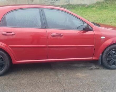 Красный Шевроле Лачетти, объемом двигателя 1.4 л и пробегом 259 тыс. км за 3500 $, фото 12 на Automoto.ua