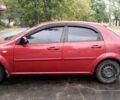Красный Шевроле Лачетти, объемом двигателя 1.6 л и пробегом 264 тыс. км за 2500 $, фото 1 на Automoto.ua