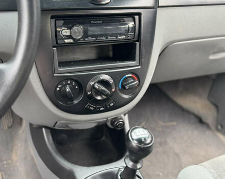 Красный Шевроле Лачетти, объемом двигателя 1.6 л и пробегом 251 тыс. км за 4000 $, фото 32 на Automoto.ua