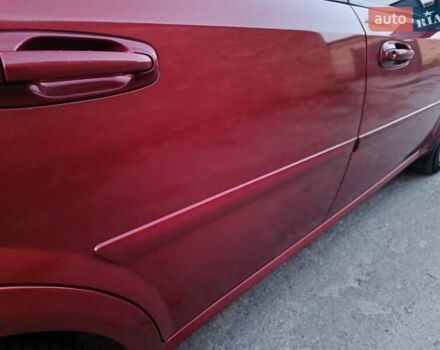 Красный Шевроле Лачетти, объемом двигателя 1.6 л и пробегом 261 тыс. км за 3650 $, фото 10 на Automoto.ua