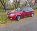 Красный Шевроле Лачетти, объемом двигателя 1.6 л и пробегом 141 тыс. км за 3399 $, фото 12 на Automoto.ua