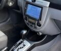Красный Шевроле Лачетти, объемом двигателя 1.8 л и пробегом 220 тыс. км за 2999 $, фото 10 на Automoto.ua