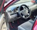 Красный Шевроле Лачетти, объемом двигателя 1.4 л и пробегом 200 тыс. км за 3200 $, фото 4 на Automoto.ua