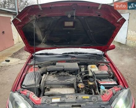 Красный Шевроле Лачетти, объемом двигателя 1.8 л и пробегом 121 тыс. км за 3750 $, фото 11 на Automoto.ua