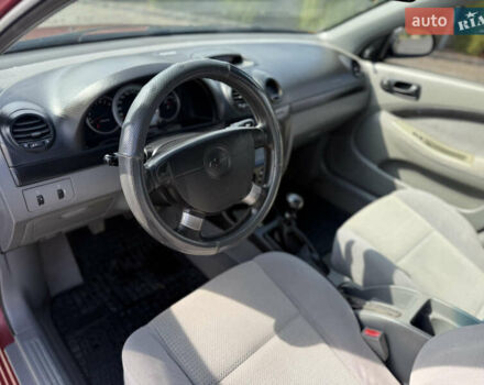 Красный Шевроле Лачетти, объемом двигателя 1.4 л и пробегом 258 тыс. км за 3300 $, фото 16 на Automoto.ua