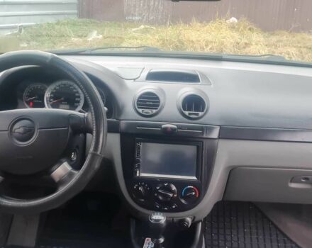 Красный Шевроле Лачетти, объемом двигателя 1.4 л и пробегом 259 тыс. км за 3500 $, фото 7 на Automoto.ua