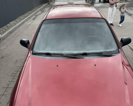 Красный Шевроле Лачетти, объемом двигателя 1.6 л и пробегом 251 тыс. км за 4000 $, фото 3 на Automoto.ua